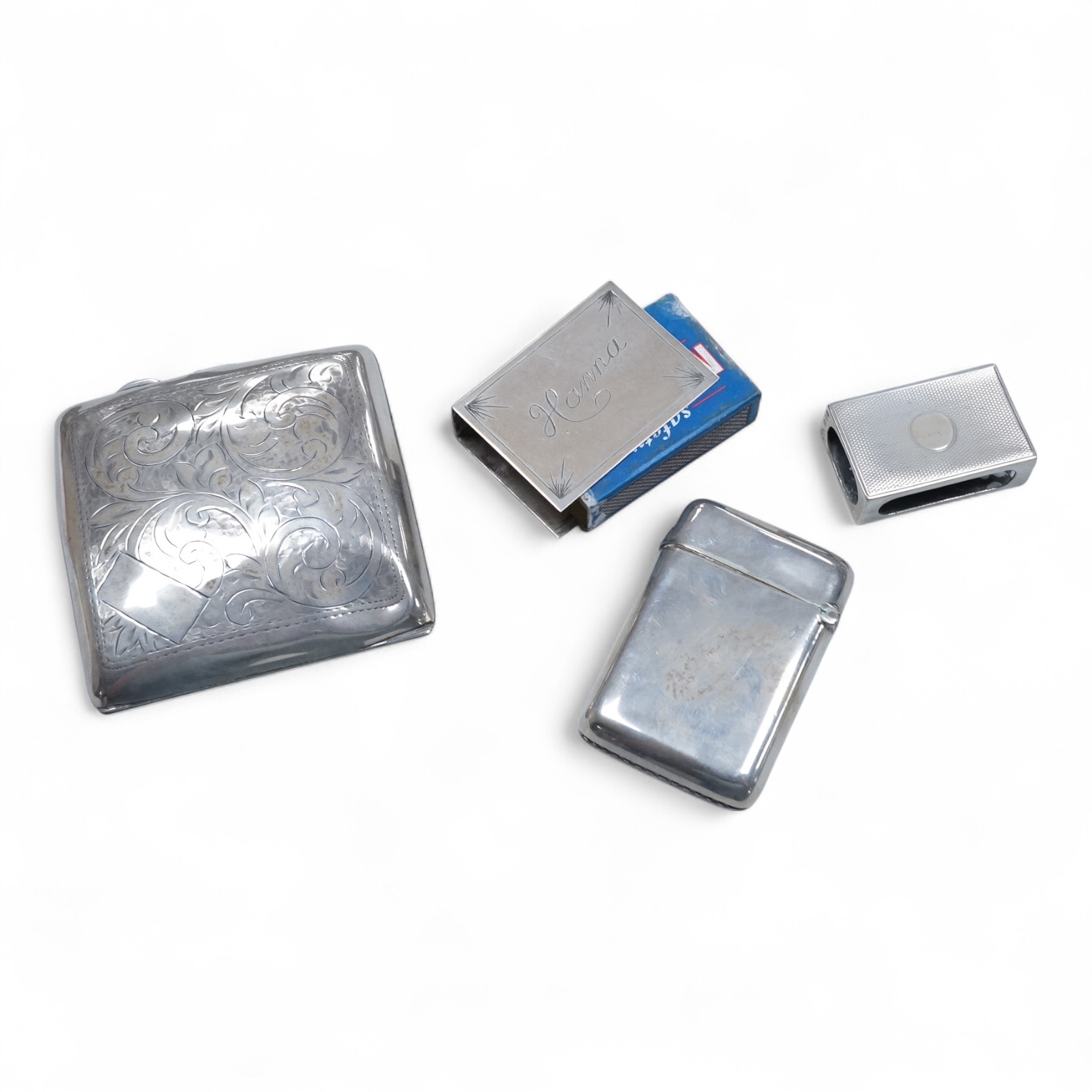 A George V engraved silver cigarette case, Birmingham, 1930, 82mm, a similar silver vesta case, London, 1913 and two silver matchbox sleeves.